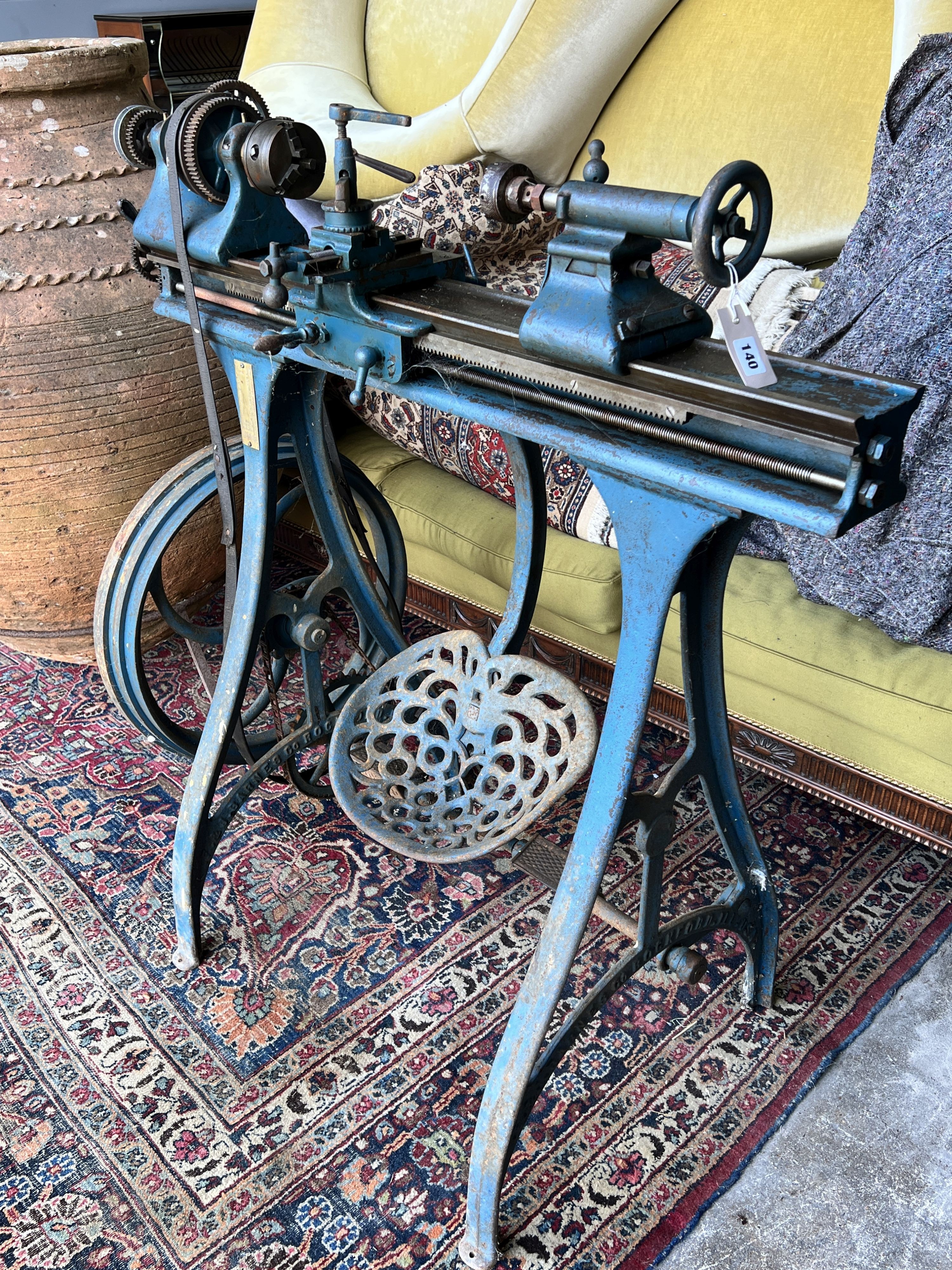 A Myford metalworkers lathe, with a three jaw chuck, width 108cm, height 116cm